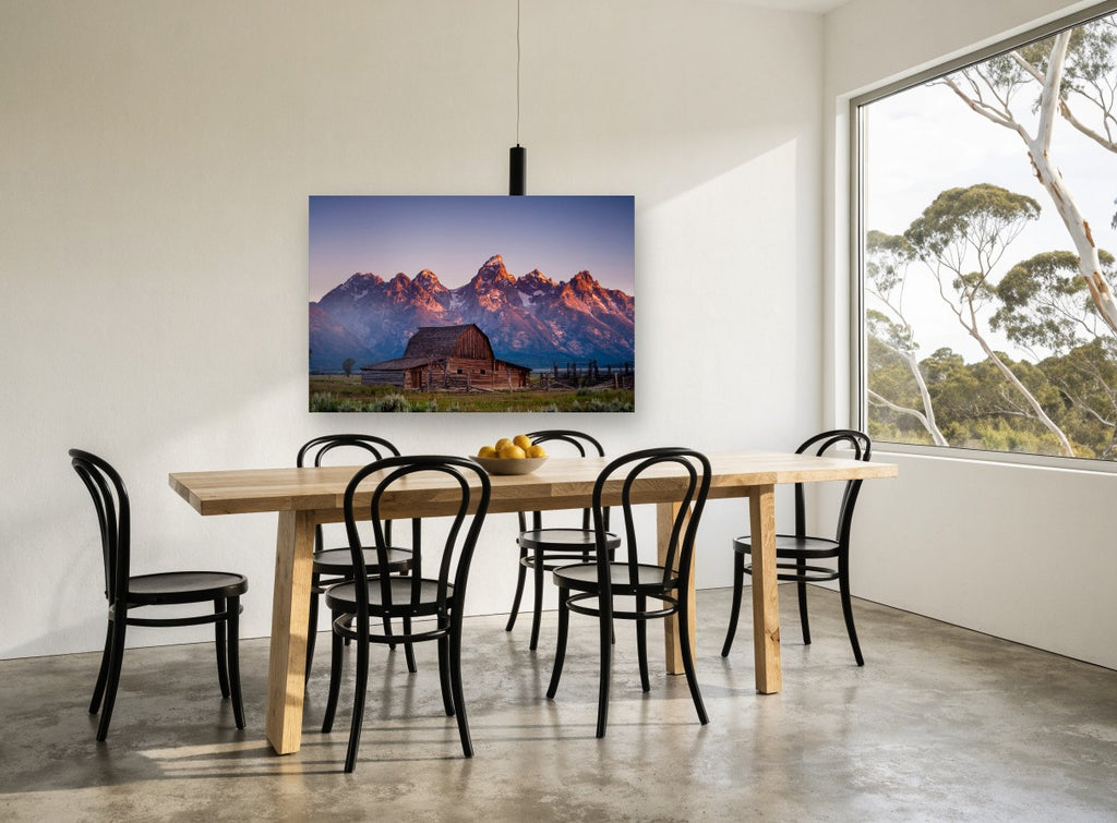 First Light Barn landscape canvas print on the wall of a dining room