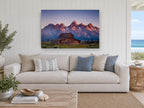 First Light Barn landscape canvas print on the wall of a beach house living room