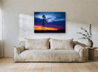 Windmill at Dusk Glow landscape canvas print on the wall of a living room