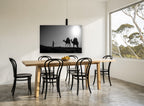 Ridge Line Caravan landscape canvas print on the wall of a dining room