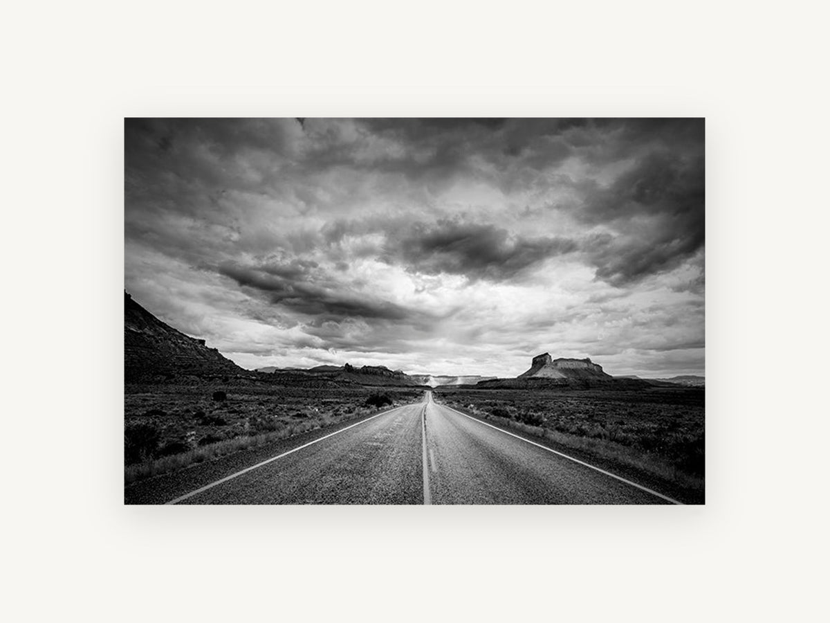 Desert Road Storm, black and white desert road photograph, landscape canvas wall art print, front view