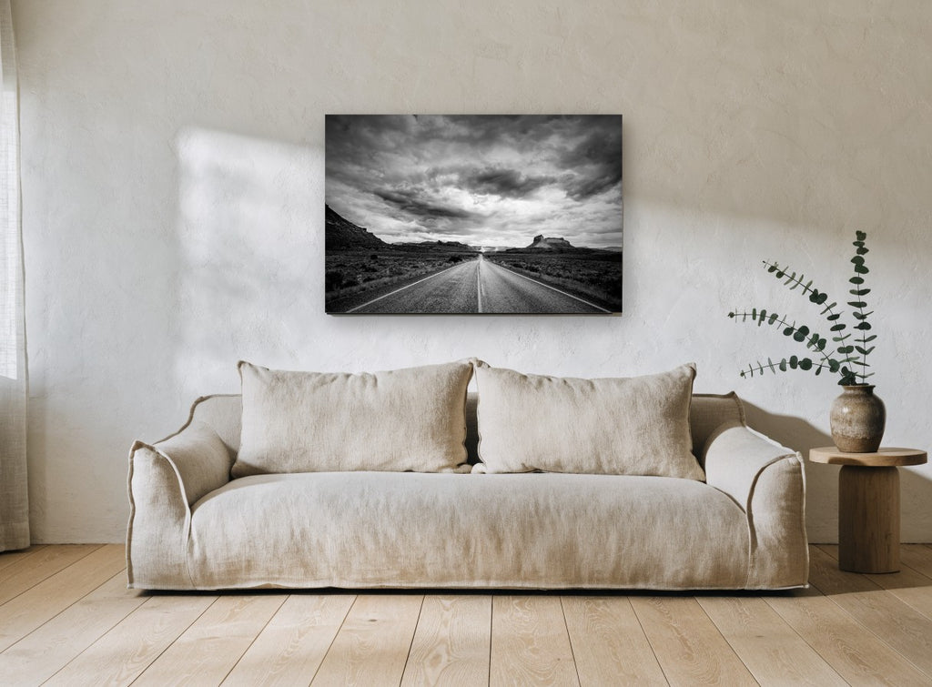 Desert Road Storm landscape canvas print on the wall of a living room