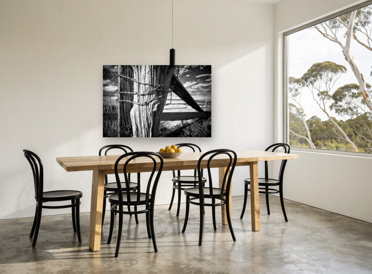 Weathered Fence Post landscape canvas print on the wall of a dining room