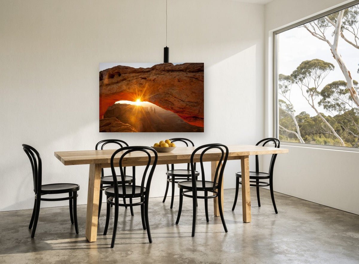 Sunburst Through Sandstone landscape canvas print on the wall of a dining room