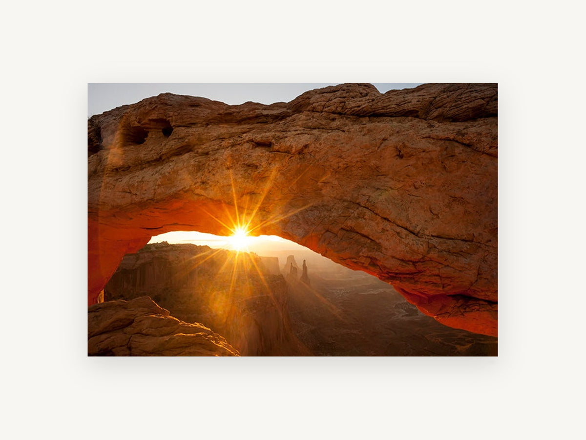 Sunburst Through Sandstone, sunrise through desert rock arch photograph, landscape canvas wall art print, front view