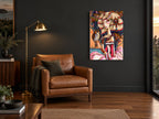 Owl and the Lotus Queen animal canvas print on the wall of a charcoal living room