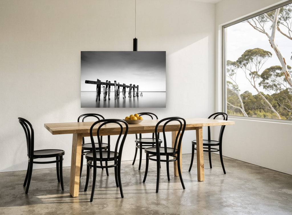 Weathered Jetty Stillness landscape canvas print on the wall of a dining room