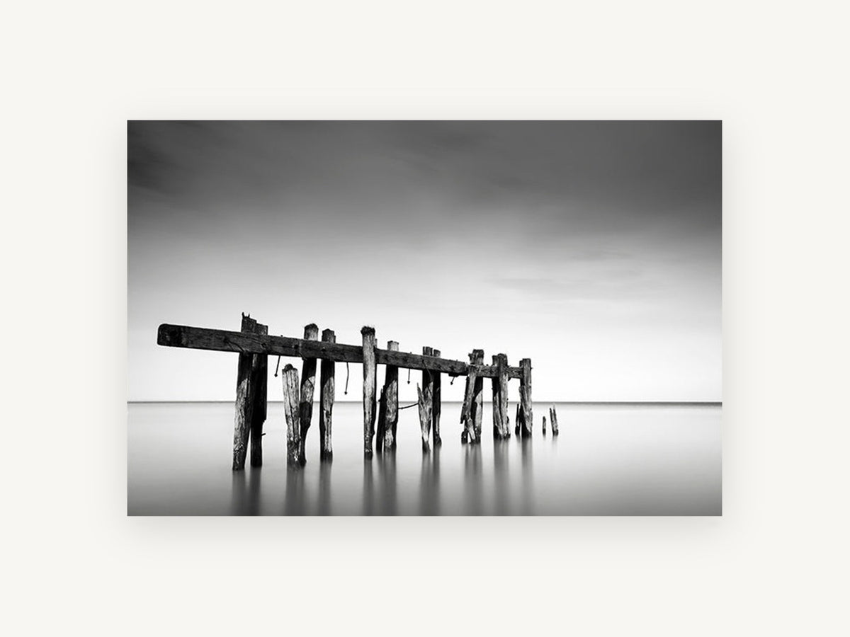 Weathered Jetty Stillness, black and white old jetty seascape, landscape canvas wall art print, front view