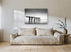 Weathered Jetty Stillness landscape canvas print on the wall of a living room