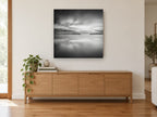 Still Harbour Mouth coastal canvas print on the wall of a living room above a sideboard