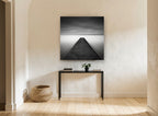 Concrete Jetty Stillness coastal canvas print on the wall of a hallway