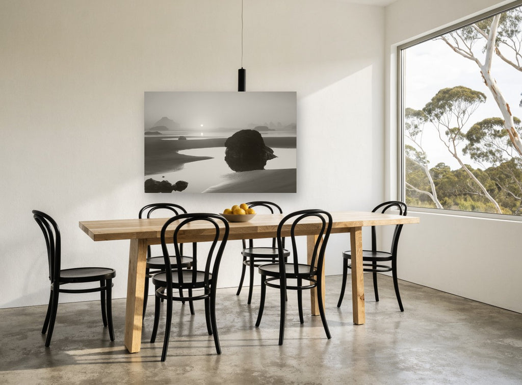 Misty Tidepool Sunrise coastal canvas print on the wall of a dining room