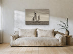 Ketch on Quiet Water coastal canvas print on the wall of a living room