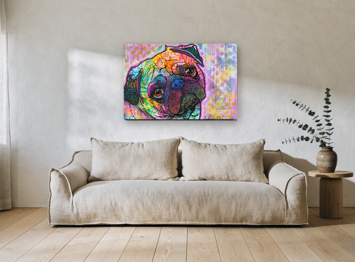 Rainbow Pug Gaze animal canvas print on the wall of a living room