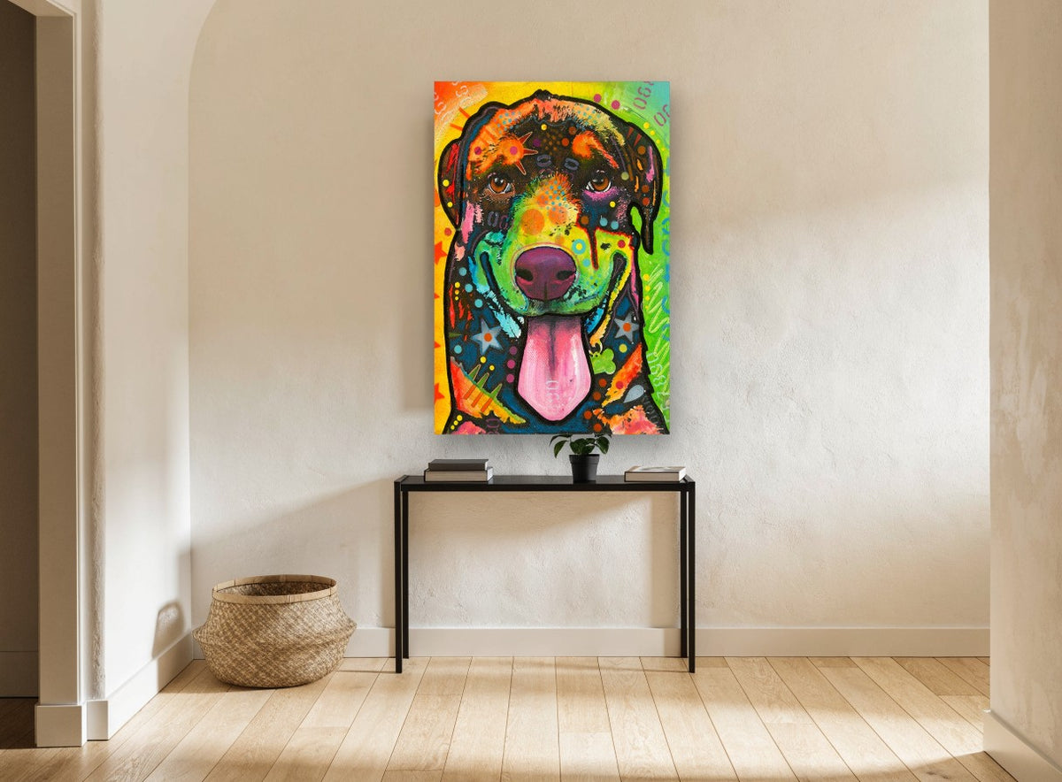 Grinning Rottie Pop animal canvas print on the wall of a hallway