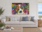 Rainbow Papillon Stare animal canvas print on the wall of a beach house living room