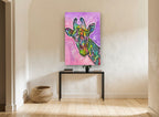 Rainbow Giraffe Pop animal canvas print on the wall of a hallway
