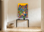 Technicolour Wolf Gaze animal canvas print on the wall of a hallway