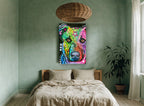 Rainbow Pup Close-Up animal canvas print on the wall of a bedroom