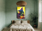 Neon Tabby Gaze animal canvas print on the wall of a bedroom