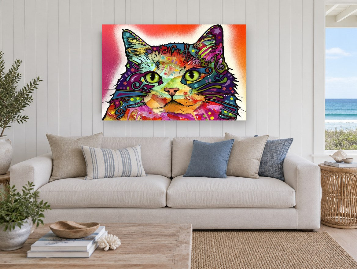 Neon Patchwork Cat animal canvas print on the wall of a beach house living room