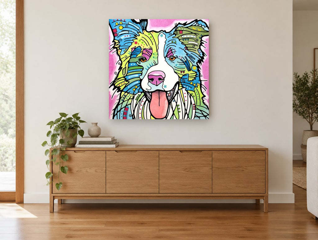 Bright Border Collie animal canvas print on the wall of a living room above a sideboard