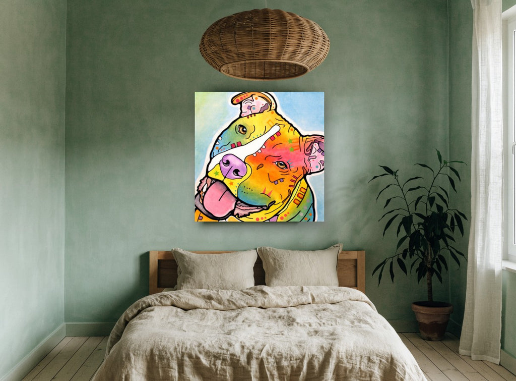 Tilted Head Rainbow Staffy animal canvas print on the wall of a bedroom