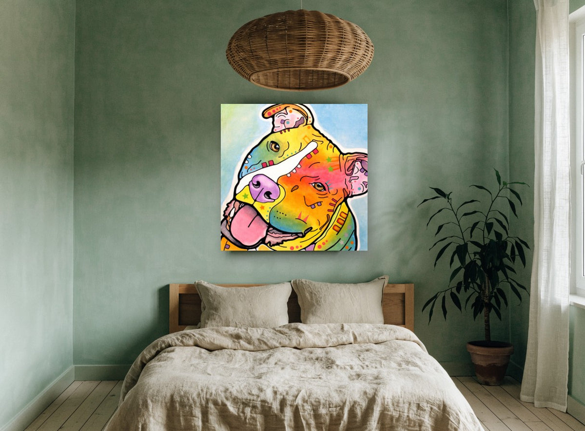 Tilted Head Rainbow Staffy animal canvas print on the wall of a bedroom