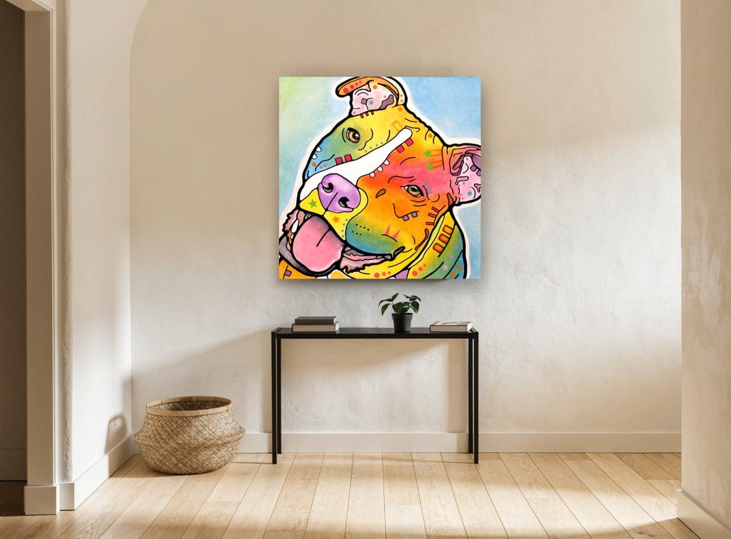 Tilted Head Rainbow Staffy animal canvas print on the wall of a hallway