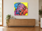 Tilted Head Mastiff animal canvas print on the wall of a living room above a sideboard