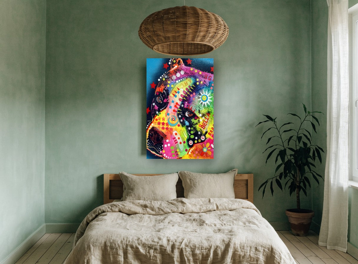 Bella Rainbow Pit Bull animal canvas print on the wall of a bedroom