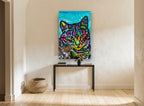 Neon Tabby Pop animal canvas print on the wall of a hallway
