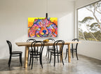 Smiling Rainbow Pup animal canvas print on the wall of a dining room