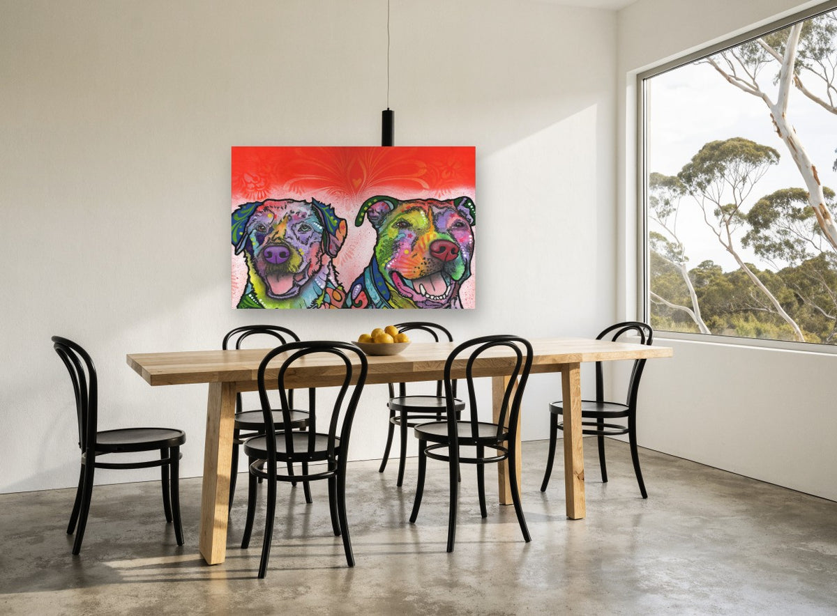 Two Bright Pups animal canvas print on the wall of a dining room