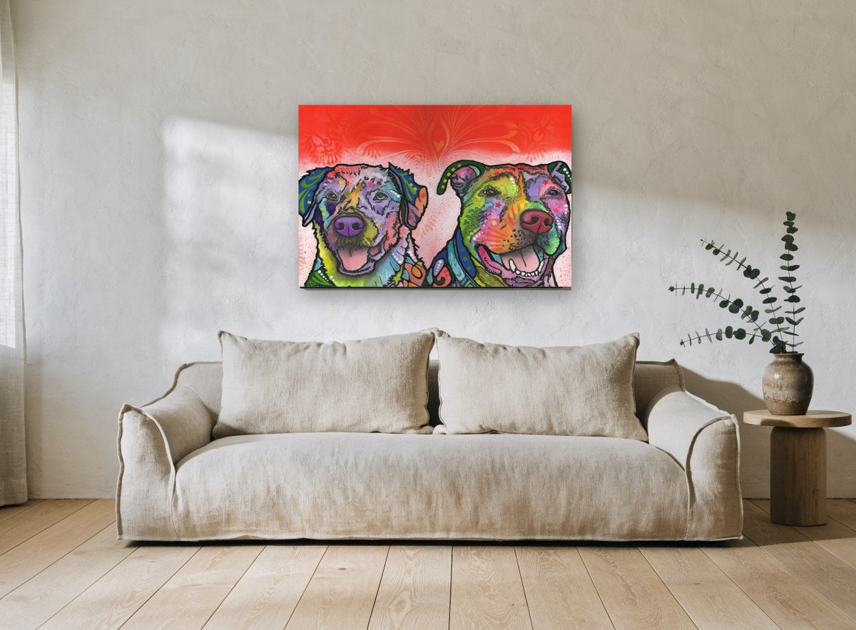 Two Bright Pups animal canvas print on the wall of a living room