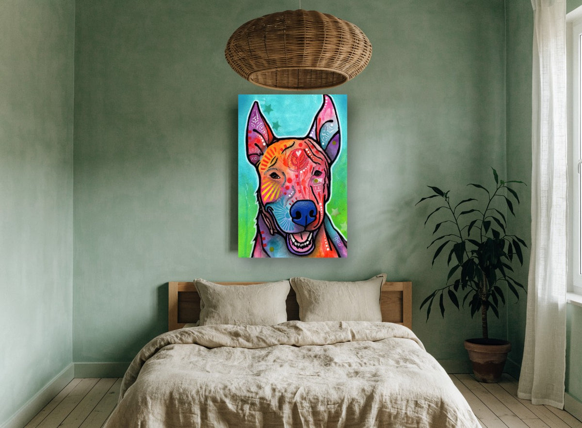 Boo the Rainbow Pup animal canvas print on the wall of a bedroom