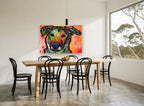 Neon Pop Pup animal canvas print on the wall of a dining room