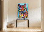 Rainbow Tabby Stare animal canvas print on the wall of a hallway