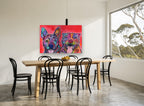 Two Happy Pups in Colour animal canvas print on the wall of a dining room