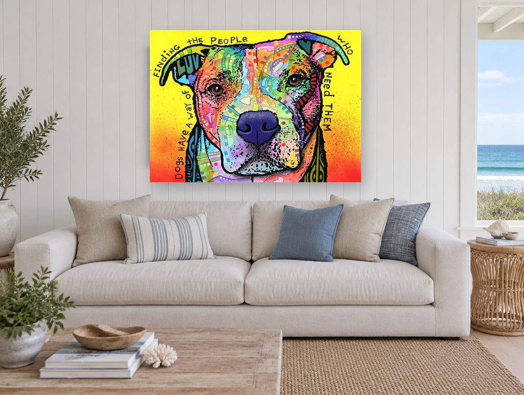 Dogs Find Their People animal canvas print on the wall of a beach house living room