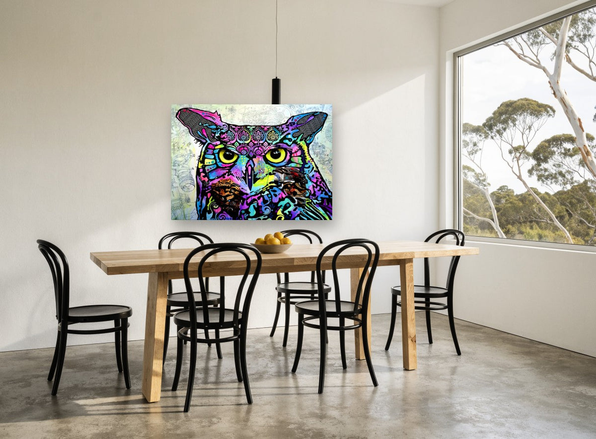 Neon Patchwork Owl animal canvas print on the wall of a dining room