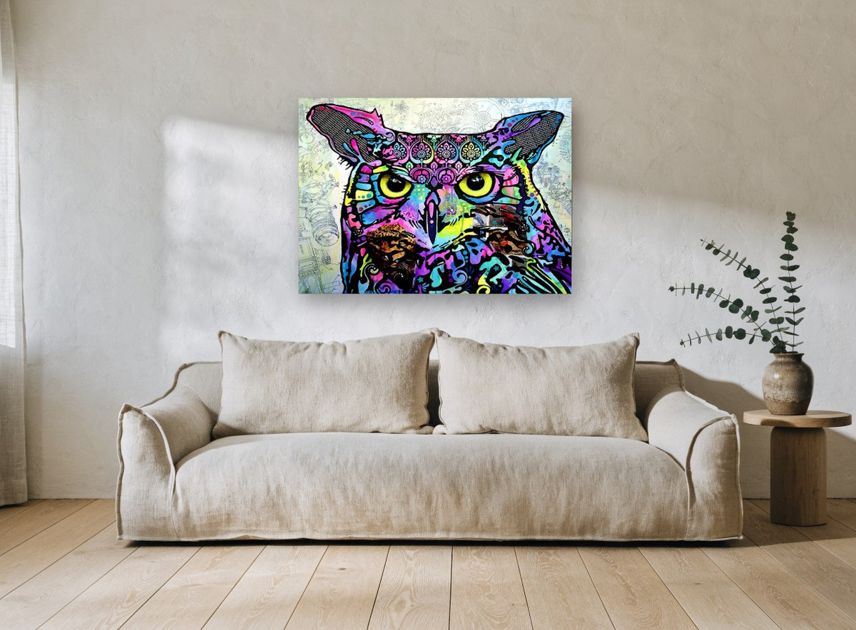 Neon Patchwork Owl animal canvas print on the wall of a living room
