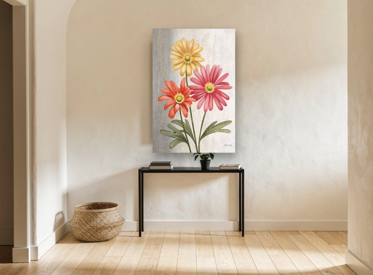 Three Gerbera Trio floral canvas print on the wall of a hallway