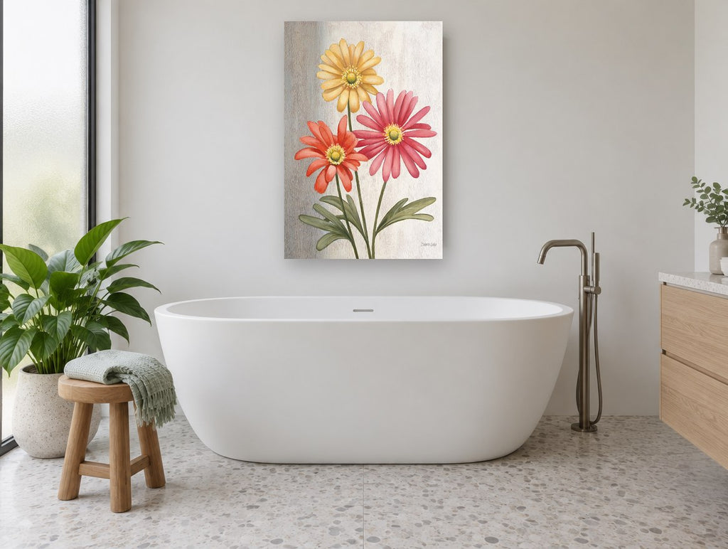 Three Gerbera Trio floral canvas print on the wall of a bathroom