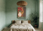 Red Anemones in Cream Vase floral canvas print on the wall of a bedroom