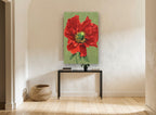 Crimson Poppy Bloom floral canvas print on the wall of a hallway