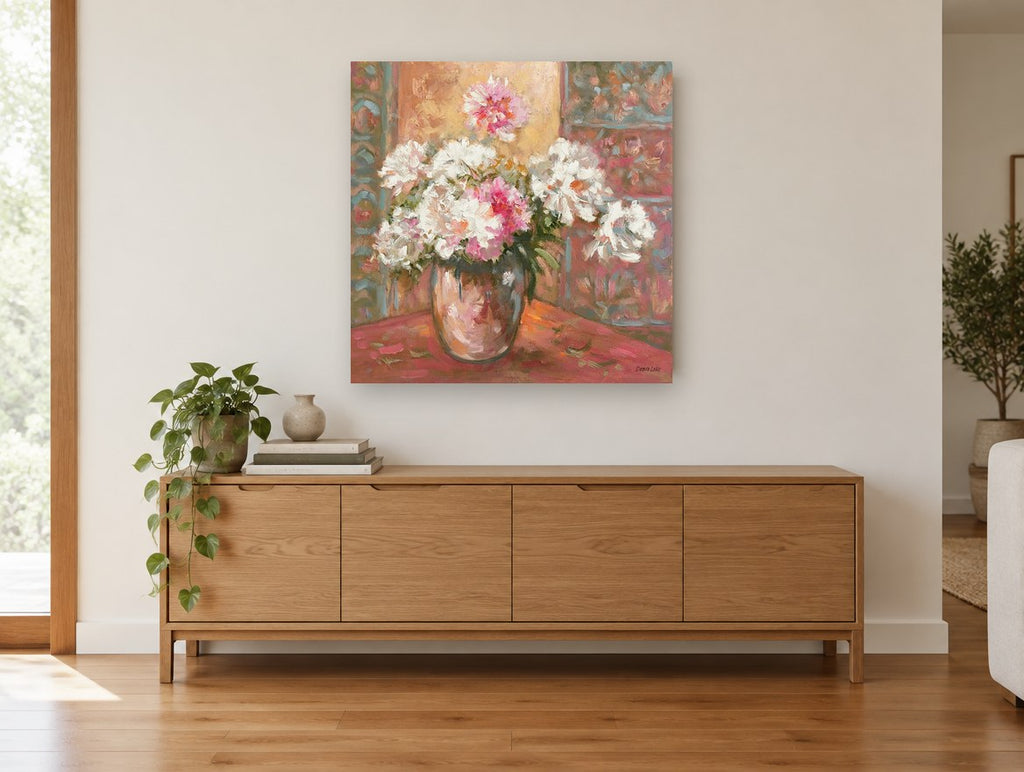 Peonies in Glass Vase floral canvas print on the wall of a living room above a sideboard