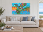 Bird Island Village coastal canvas print on the wall of a beach house living room