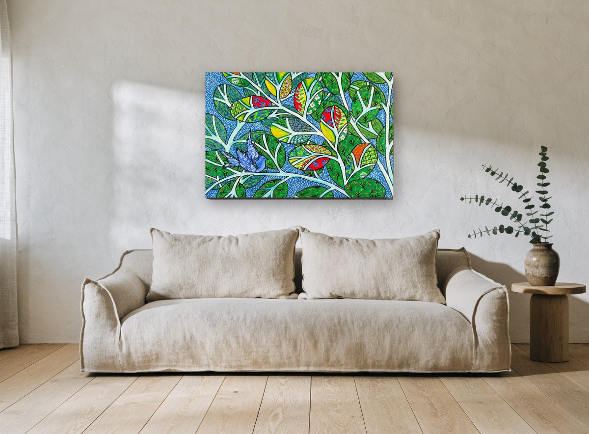 Blue Bird in Patchwork Leaves floral canvas print on the wall of a living room