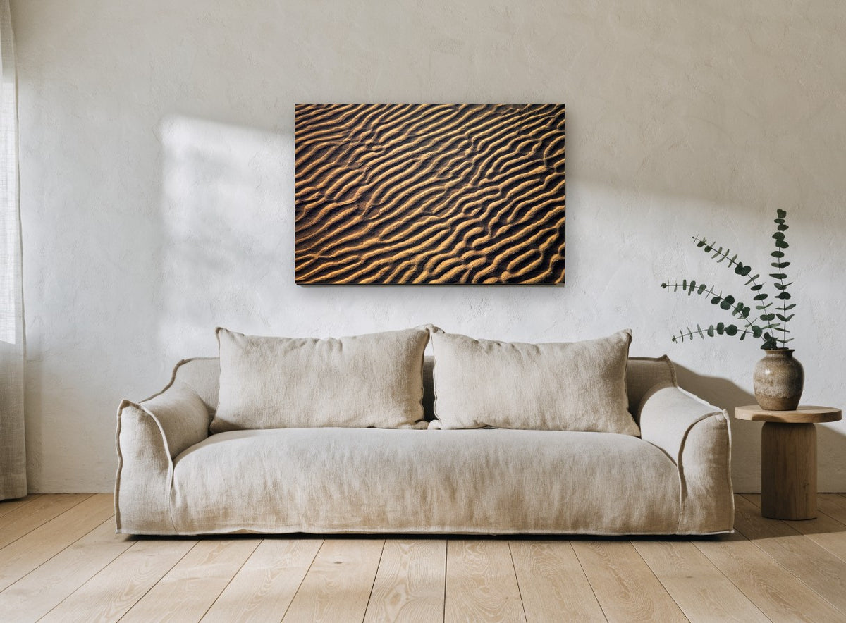 Golden Sand Ripples coastal canvas print on the wall of a living room